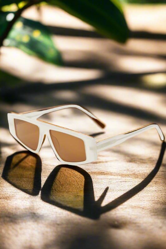 Aperitivo sunglasses featuring bold geometric frames and UV400 protection, perfect for making a statement.